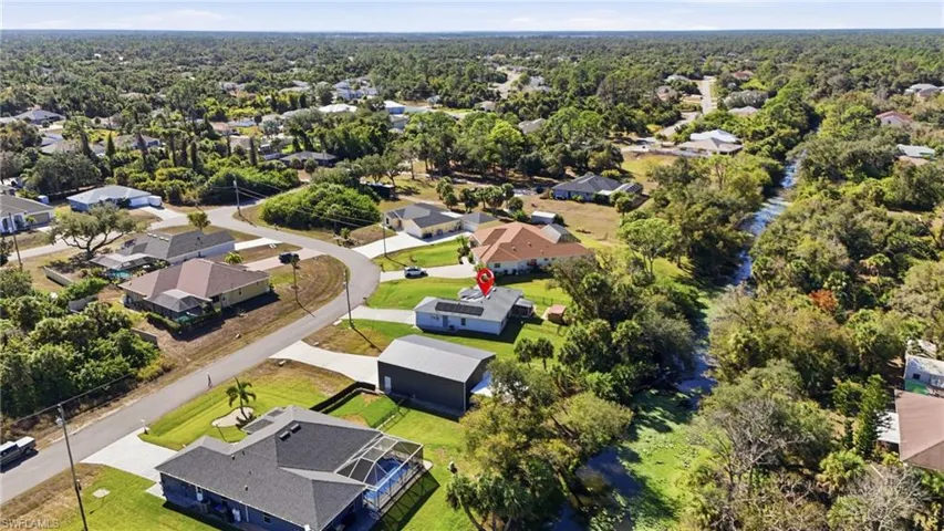 Aerial view of canal behind house