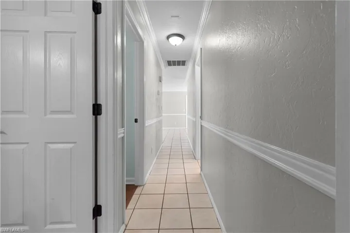Hallway to the bedrooms and guest bath