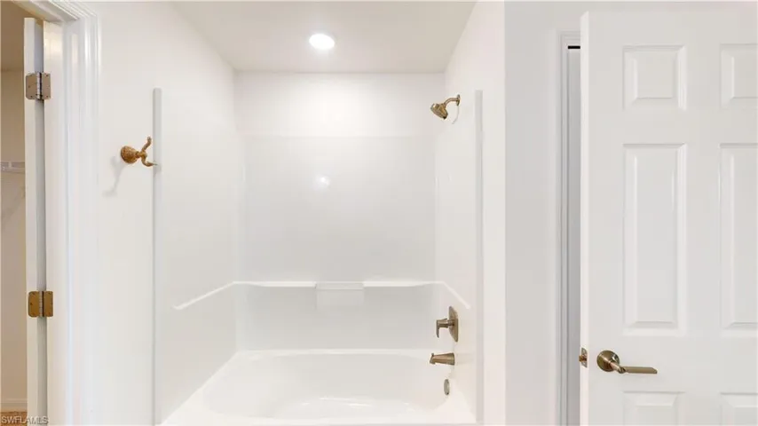 Bathroom with shower / bath combination