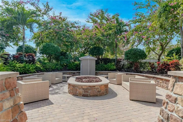 View of patio / terrace featuring an outdoor living space with a fire pit