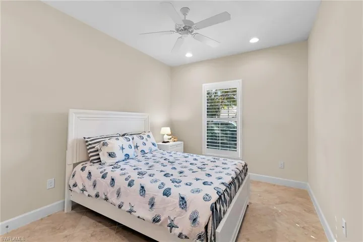 Bedroom featuring a ceiling fan and recessed lighting