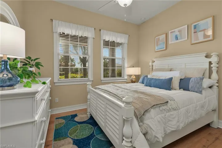 Bedroom featuring hardwood / wood-style flooring and ceiling fan