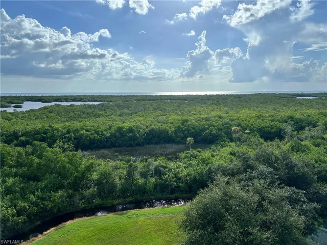 Primary bedroom with breathtaking views overlooking the Gulf
