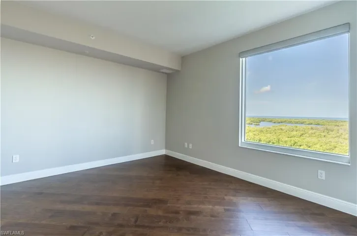 Great room looking towards kitchen and entryway