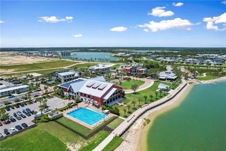 Aerial view of a large body of water and a pool area