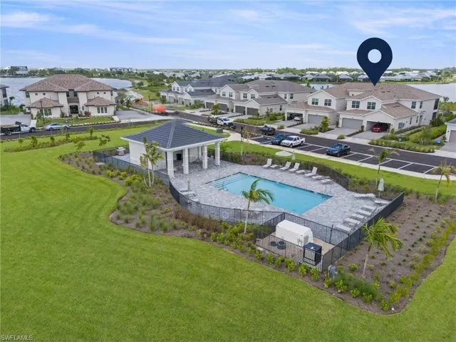 Aerial view of residential area with a pool area