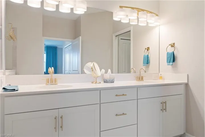 Bathroom featuring double vanity