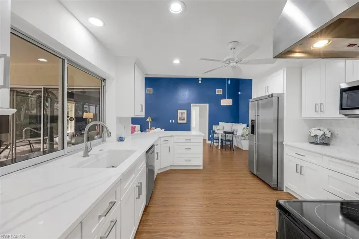 Kitchen with pass thru window to patio