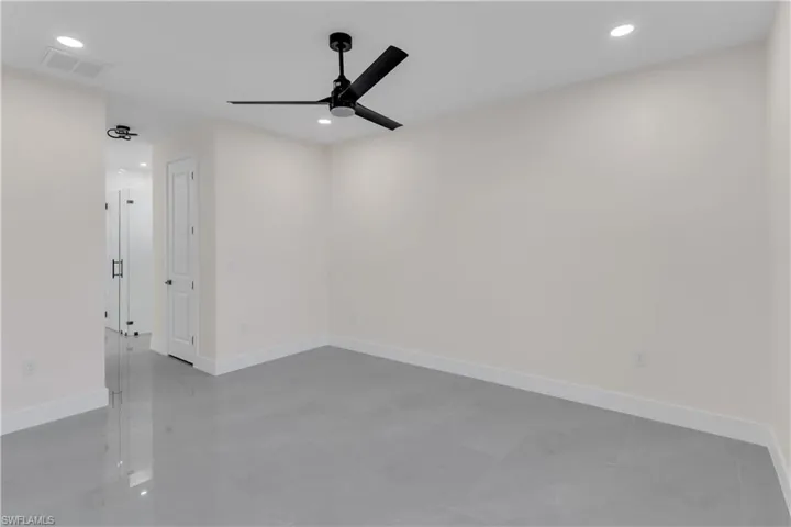 Unfurnished room with ceiling fan