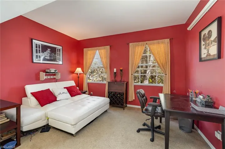 View of carpeted home office