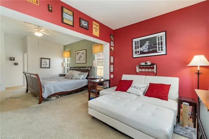 Bedroom featuring carpet and ceiling fan