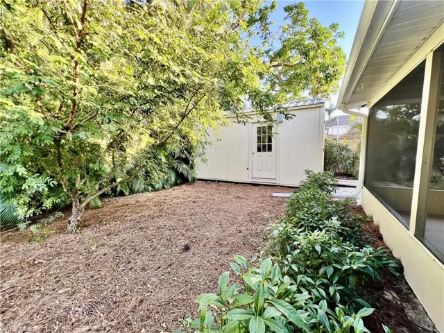 View of yard featuring a shed