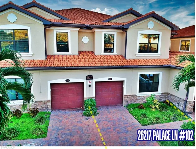 Mediterranean / spanish-style home featuring a garage