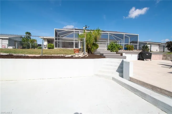 Dock and fenced yard