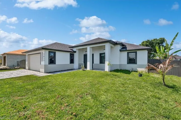 1013  Chaplin  AVE, Lehigh Acres, FL 33971
