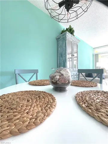 Dining area view of a textured ceiling