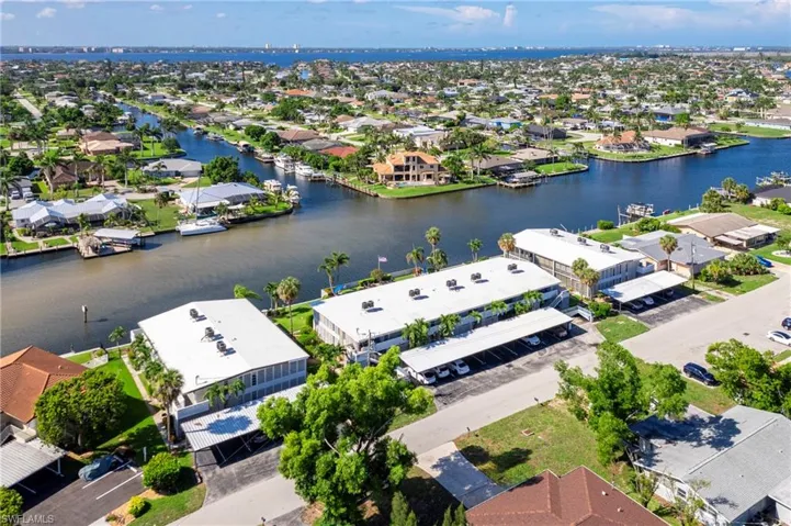 Aerial view of residential area with a nearby body of water