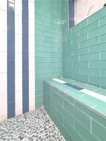 Bathroom with a tile shower
