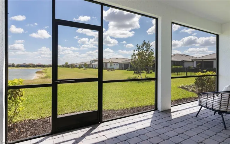 Unfurnished sunroom with a residential view