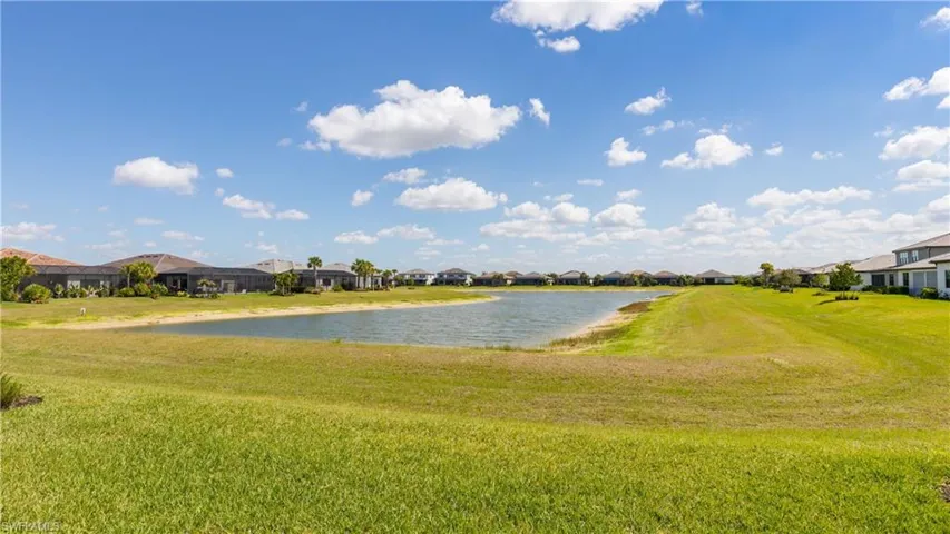 Water view featuring nearby suburban area