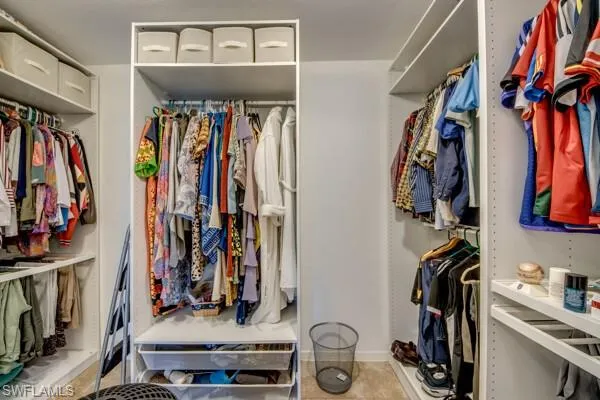 Walk in closet featuring tile patterned floors