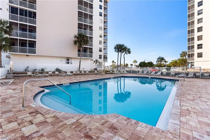 Community pool with a large sundeck
