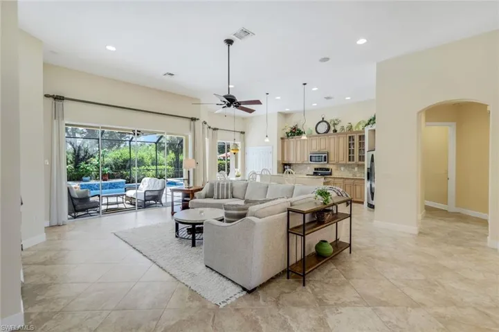 Tiled living room with ceiling fan