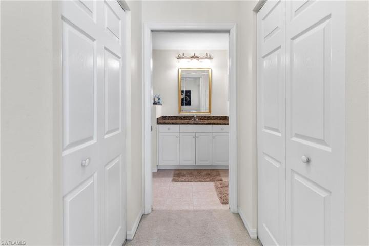 Two owner walk-in closets in primary bedroom