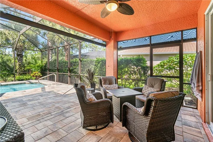 AMAZING COVERED AREA UNDER THE LANAI WITH NEW "STORM SMART" ELECTRIC STORM SCREENS!