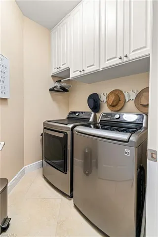 THE LAUNDRY ROOM COMES WITH A NEW HIGH-END WASHER & DRYER PLUS PLENTY OF CABINETS!