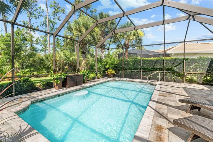 POOL SURFACE REFINISHED IN 2023, REFURBISHED POOL CAGE W/NO-SEE-UM SCREENS IN 2024 & NEW POOL HEATER & CIRCULATION PUMP INSTALLED IN 2021=A BRAND NEW POOL FOR YOU TO ENJOY!