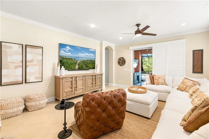 BEAUTIFUL GREAT ROOM WITH PLANTATION PRIVACY SHUTTERS TO THE LANAI & YOUR SALT WATER POOL.