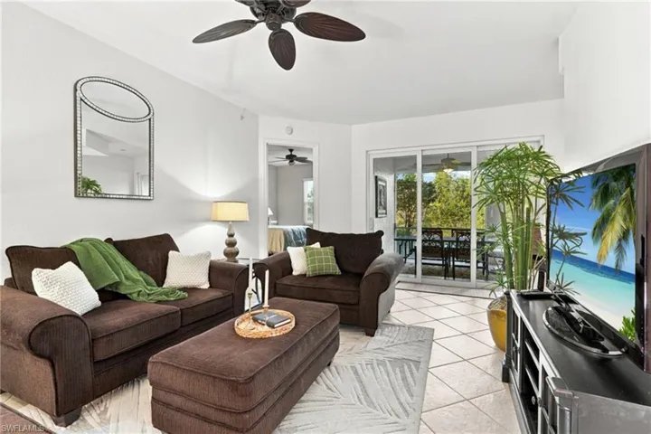 Recessed lighting, ceiling fan, and tile flooring