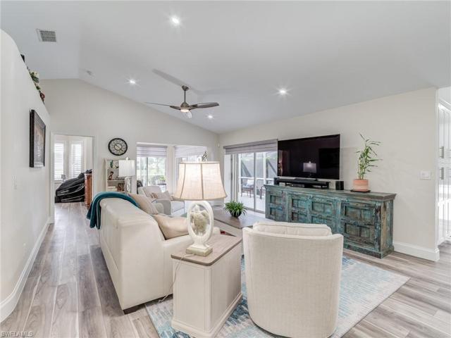 Great room has vaulted ceiling and all new LED lighting