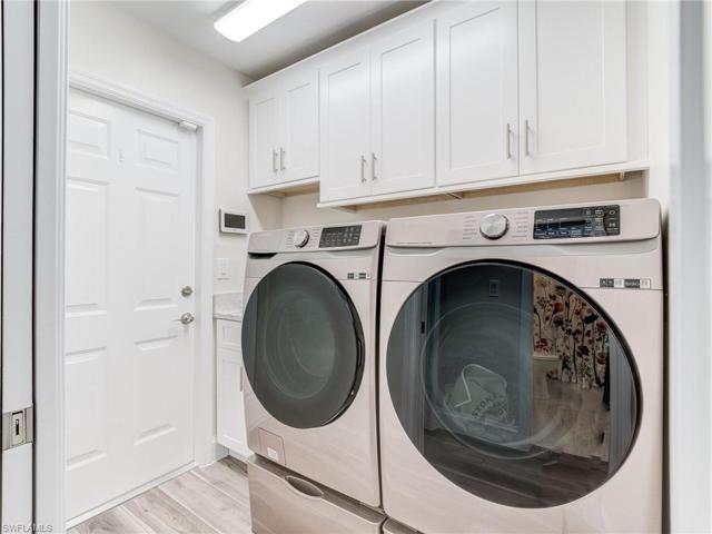 Laundry with cabinets & sink