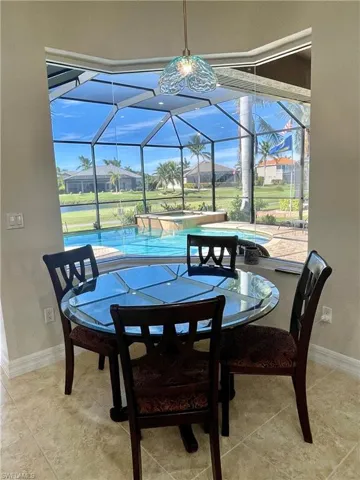 View of patio with a lanai