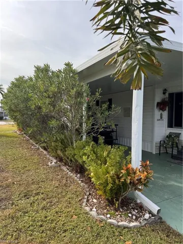 Side of home, landscaped with Oleander