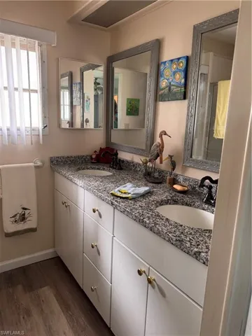 Master bathroom, double sink, granite countertops, soft close cabinets and custom window blinds