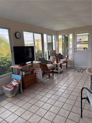 Sunroom with natural light, tile floors, easy slide windows
