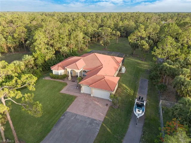 Aerial overview of property's location with a forest
