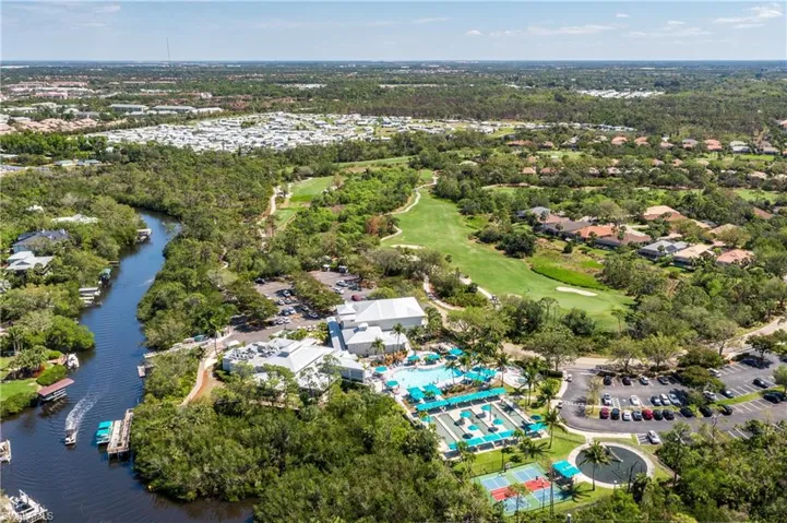 The River CLub, view of the boat ramp and boat dock with beach shuttle on Estero River