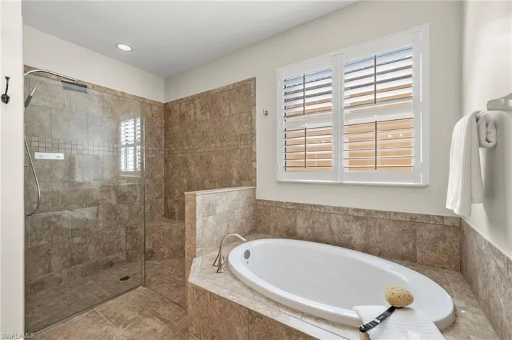 Bathroom with independent shower and bath