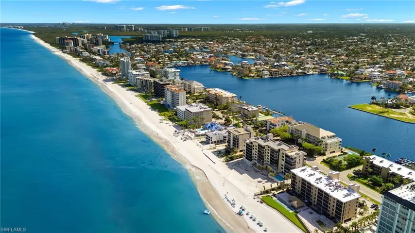 Aerial view with a view of the beach and a water view