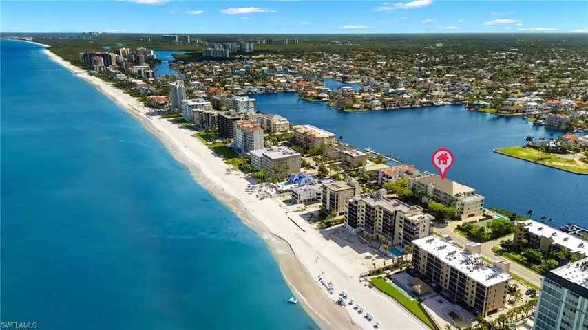 Bird's eye view with a beach view and a water view