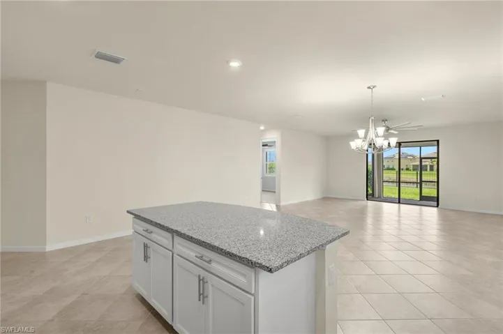 Breakfast bar and living room.