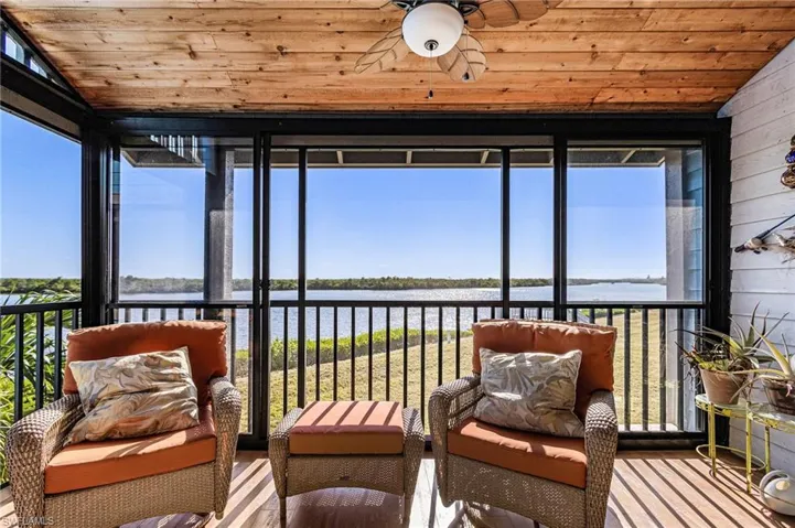 Lanai with vaulted ceiling and water view!