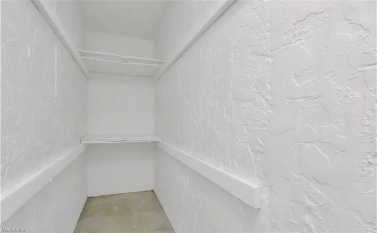 large storage area off middle bedroom closet