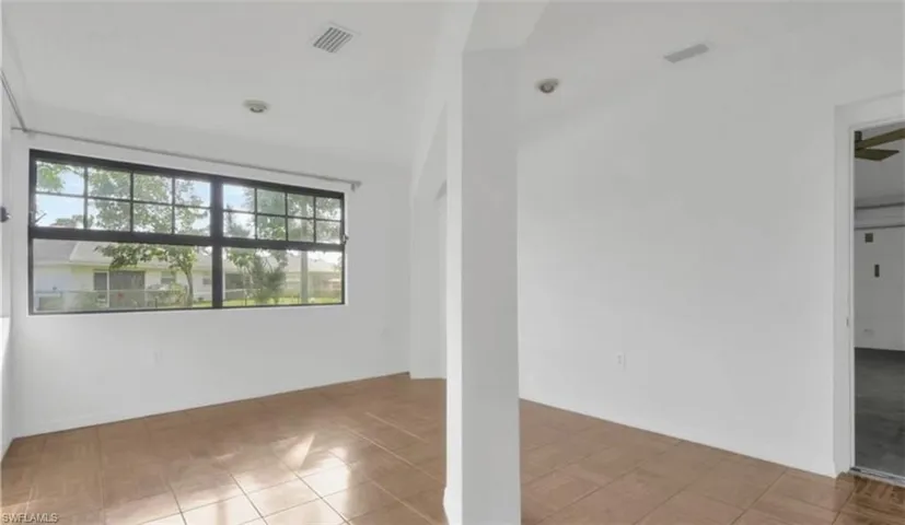 Extra bedroom off garage prior to workshop conversion
