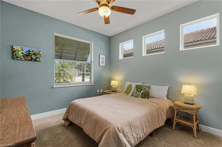 Bedroom with carpet floors and ceiling fan