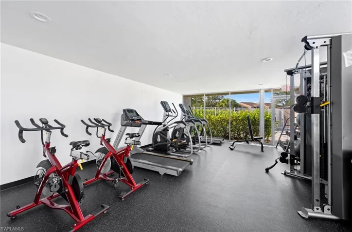Workout area with floor to ceiling windows
